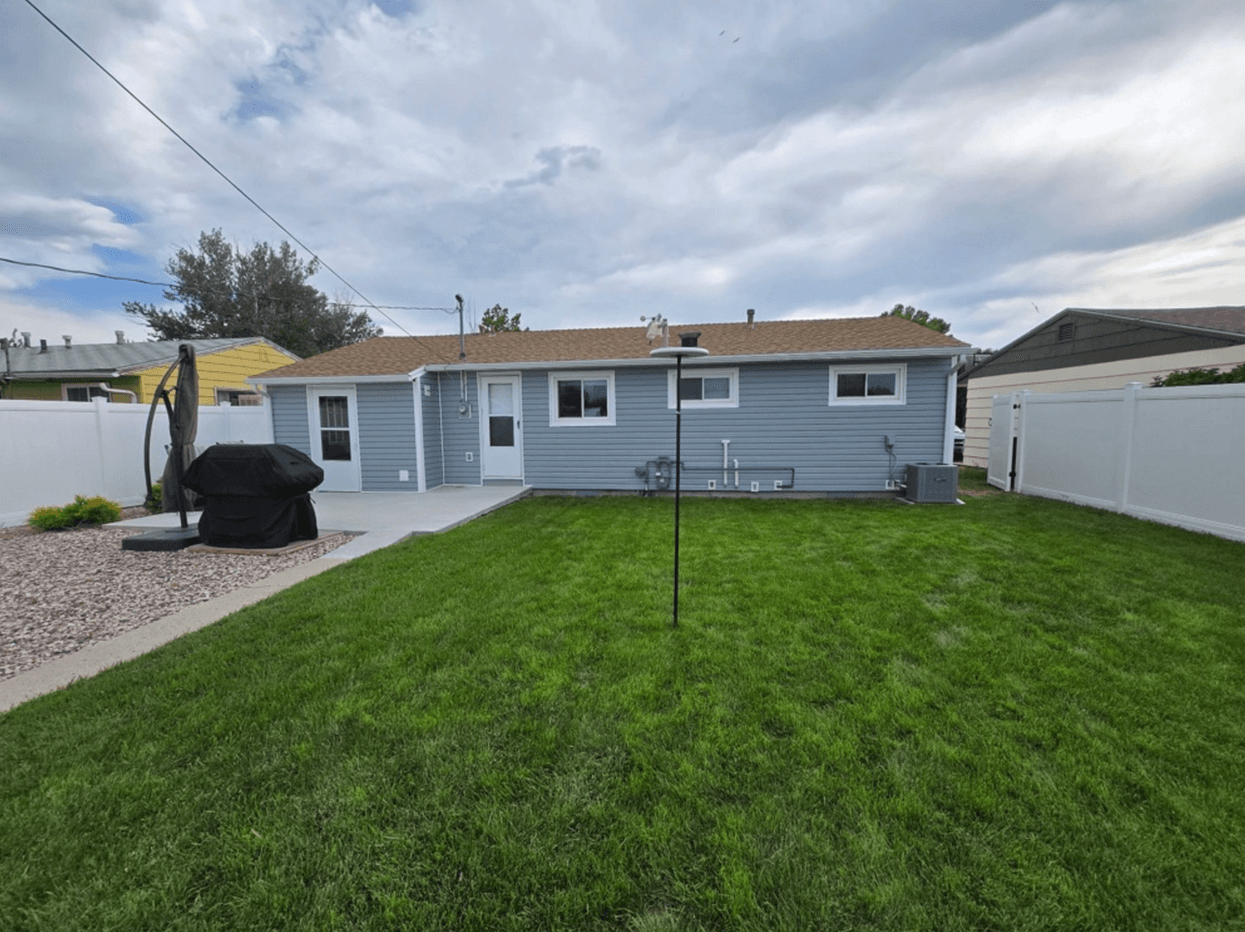 Blue Siding & White Windows — Siding project in Montana
